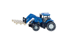 Traktor s vidlicemi na palety a paletami
